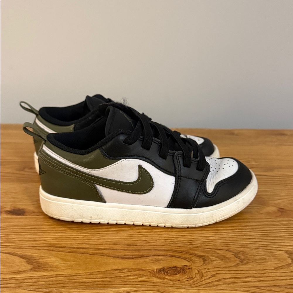 Nike Kids Air Jordan low alt shoe. Black/ White/ Olive. Size 2.5Y